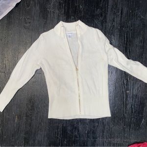 Creamy white zip up sweater with gold zipper